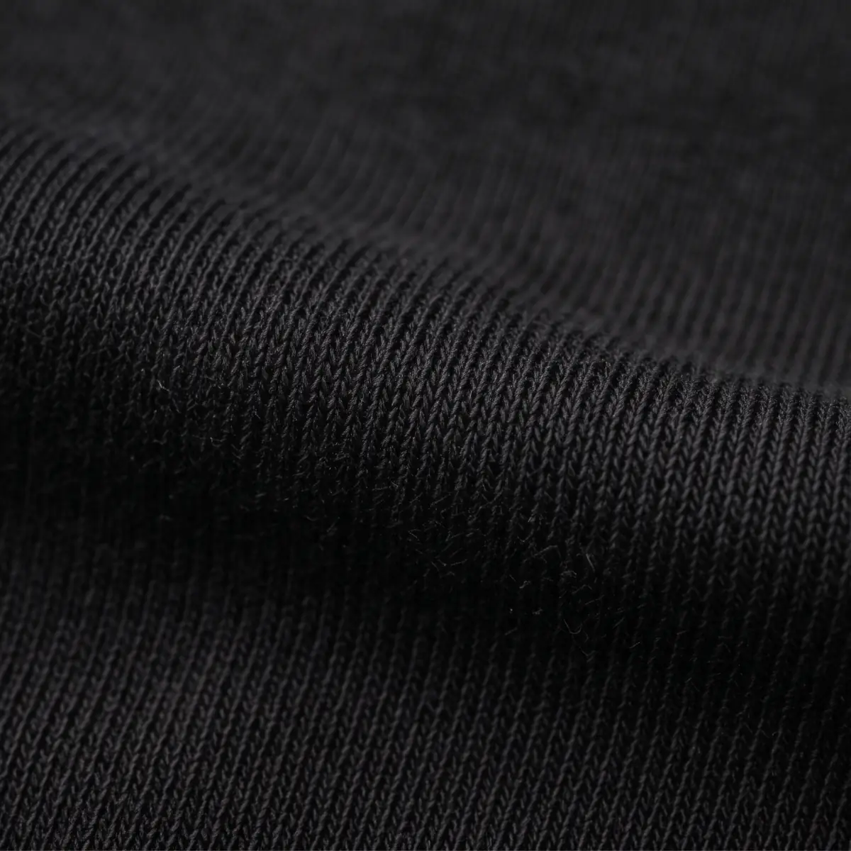 Textura de la tela 100 % algodón de la playera adulto unisex